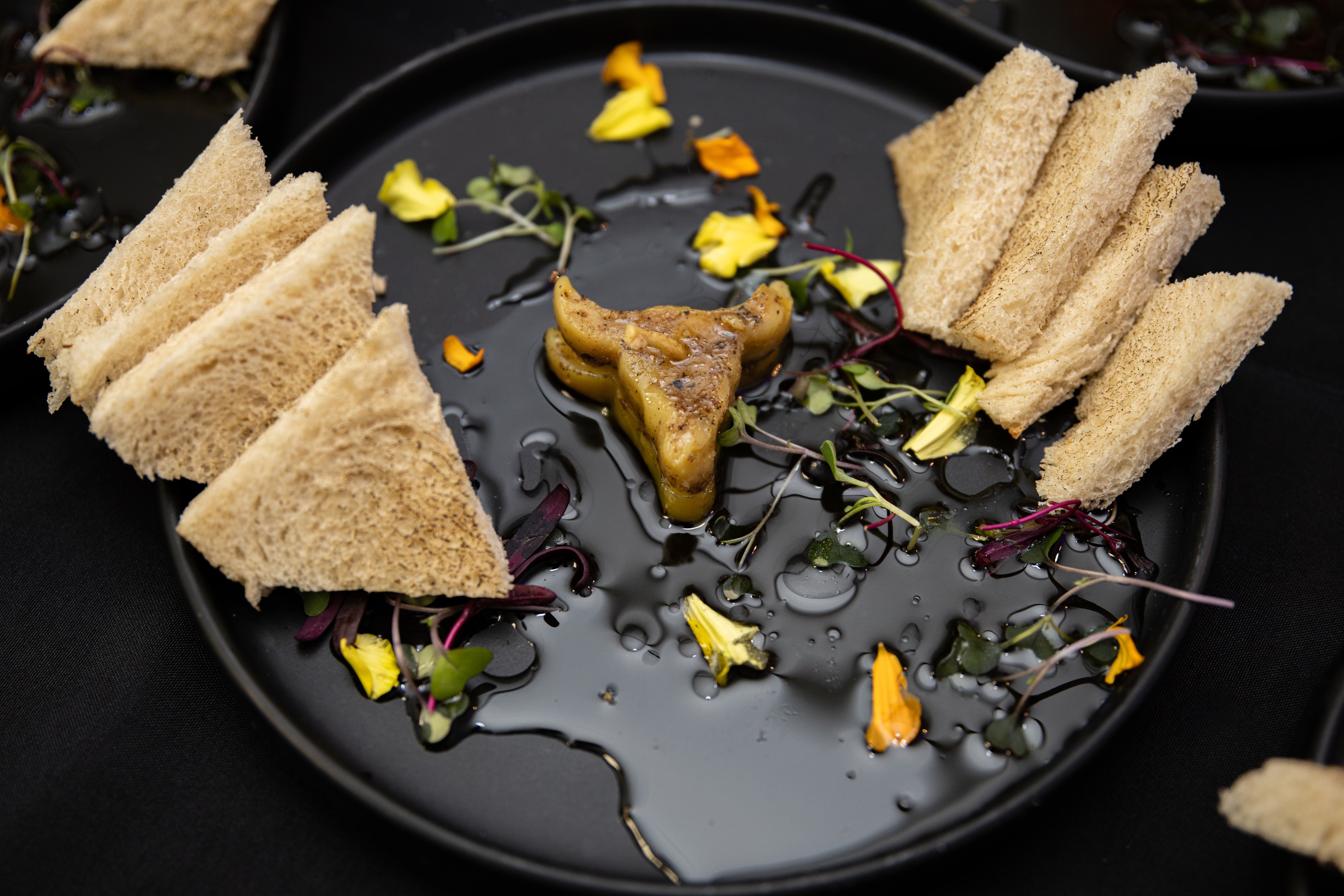 White Squirrel Concepts team plating dishes